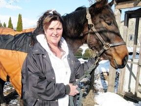DANIEL R. PEARCE  Simcoe Reformer
Marie Dean of the Waterford area wants the public to get behind a bill that would ban the slaughter of horses in Canada. Horses are like pets and should be given good homes rather than killed, she says.
