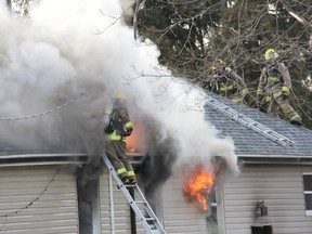 Chatham firefighters battle a blaze that destroyed a home on Indian Creek Rd. W. in Chatham, Ont., on Thursday, March 7, 2013.
ELLWOOD SHREVE/ THE CHATHAM DAILY NEWS/ QMI AGENCY