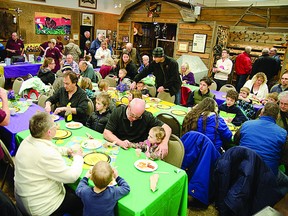 Families spend their Family Day morning at the Strathcona County Museum and Archives, where a pancake breakfast was offered. Michael Di Massa/Sherwood Park News/QMI Agency