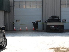 Police taped off a building in the Mountview Business Park industrial area west of the airport after a man was killed in what is believed to be a workplace explosion outside a building around 9:30 a.m. on Thursday. Occupational Health and Safety is investigating. (Patrick Callan/Daily Herald-Tribune)