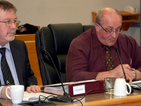 James Howie, city treasurer, left, and Joe Torlone, chief administrator for the City of Timmins, offered city councillors a few options for reducing expenses during a budget meeting held Thursday night.