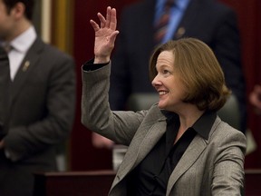 Alberta Premier Alison Redford and Alberta Finance Minister Doug Horner the Alberta Legislature in Edmonton, Alta., on Thursday, March 7, 2013. Ian Kucerak/QMI Agency