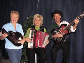 The first Devon Music Jamboree, at which 18 musicians performed for a crowd of nearly 40, was held at the Pioneer 73 Club on Wednesday, Feb. 27. After its success in the first go round the club is now planning on hosting a jamboree on a regular basis, on the fourth Wednesday of each month.
Pictured: Christine Bernier, Sylvia Paul, and George Bernier.