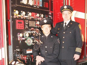 Capt. Alex Plant and his son Brian pose for a portrait during the Firemen’s Ball at the Drill Hall March 2. The Plants have always had a member of their family volunteering with the local fire services since its inception 110 years ago.