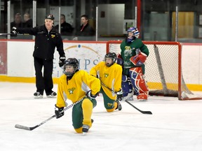 The Timmins Trademark Mechanical North Stars open the second round of the Northern Ontario 'AAA' Hockey League playoffs on Saturday against the Nickel City Sons at the McIntyre Arena. The North Stars were hard at work on Thursday preparing for the matchup. From left, goalie coach Derek Dallaire instructs North Stars goalie Dylan Dallaire, while Keenan Bertrand (foreground) and Alexe Clavelle take a knee during practice.