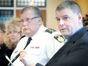 Acting Huron OPP Staff Sgt. Kevin Hummel, at right, speaks at the signing ceremony Friday for a new Threat Assessment Protocol for local schools. (SCOTT WISHART The Beacon Herald)