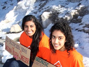 Queen's University students Simeran Bachra (left) and Alyssa Parpia are two of 11 students who are camping out next week at the corner of University Avenue and Union Street in support of 5 Days for the Homeless.
Ian MacAlpine The Whig-Standard