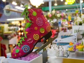 Bloomers Flowers in the Covent Garden Market is displaying decorated figure skates leading up to the world championships in London. Bloomers? owner Ian Greasley says the decorations range from skull and crossbones to jewelled to pink with swirls. The reaction, he says, has been ?incredible.? (MIKE HENSEN, The London Free Press)
