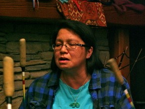 Judy DaSilva performs with the Grassy Narrows Women's Drum Group. DaSilva was the 2013 Bread and Roses award winner for Kenora's celebration of International Women's Day.