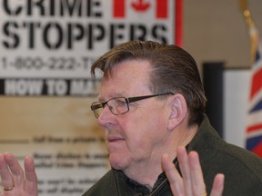 Vice-chair Tom Burmaster gestures as he speaks at a Crime Stoppers of Sault Ste. Marie and Algoma District press conference on Thursday, March 7, 2013.