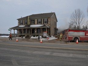 Dunkeld restaurant smoulders as fire crews pour water on a blaze at the restaurant Sunday morning.