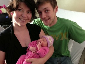 Bria Marshall, 27, and Danny Ryman, 24, hold their day-old daughter Danielle Marshall at the IWK Health Centre in Halifax. Both parents believe the Canada of yesterday was somehow better, but also think tomorrow will be great again. (THANE BURNETT/QMI Agency)