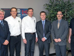 Oxford MP Dave MacKenzie visited Tillsonburg’s J/E Bearing and Machine Ltd. recently, as part of the announcement of a $4.35 million subcontract from General Dynamics Land Systems Canada. From left, are: MP Dave MacKenzie, J/E vice-president Chuck Hendricks, president Joe Volkaert; and Nick McCabe, Ken Hill and Josh Suhanji, General Dynamics Land Systems Canada. CONTRIBUTED PHOTO