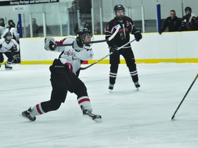 Caps forward Brooke-Lyn Riley takes a slapshot during Sunday's 1-0 win over Pembina Valley. (Kevin Hirschfield/PORTAGE DAILY GRAPHIC/QMI AGENCY)