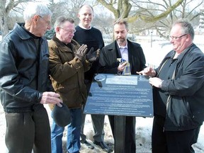 Taking part in the unveiling of a parks board plaque near the Cenotaph on Sunday are, from left, Don Cole, Coun. Frank Mark, Coun. Brad Beatty, board chair Rick Orr and Dave Gaffney. (DONAL O'CONNOR, The Beacon Herald)