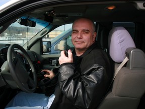 Ken McPherson, president of the Fort McMurray Amateur Radio Club, shows off his equipment in his pickup truck. From the front seat, he can talk to other operators around the world, even if the Internet and satellite systems failed. The club is accepting new members. VINCENT MCDERMOTT/TODAY STAFF