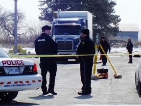 Sarnia Police closed off a portion of the Tim Horton's parking lot on London Line for much of a day as they investigated the death of a pedestrian. (QMI Agency file photo)