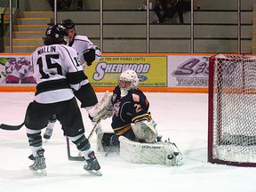 Trent Wilkie/QMI Agency
Storm goalie Nick Kulmanovsky makes a toe save with two Sherwood park Crusaders alone in front of him.