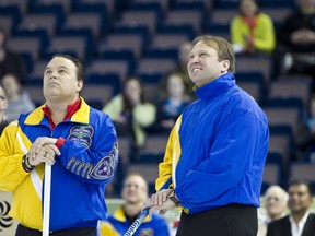 Former Brier winners Randy Ferbey, left and Marcel Rocque are seen during the 2013 Brier opening ceremonies held at Rexall Place March 2.
Ian Kucerak/Edmonton Sun