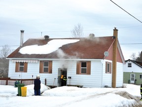 RYAN PAULSEN ryan.paulsen@sunmedia.ca Laurentian Valley firefighters work to save the Joe Street home of Denzel Shannon after a neighbour called in the fire shortly before noon on Sunday, March 10. There was nobody home at the time of the fire. For more community photos please visit our website photo gallery at www.thedailyobserver.ca.