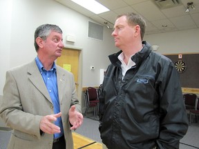 Mayor Jim Rennie, right, and MLA George VanderBurg of Whitecourt - Ste. Anne constituency, chat at a meeting called by the MLA, who is the Associate Minister of Seniors, for the introduction of the government’s budget. 
Ann Harvey | QMI Agency