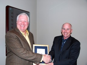 John Henry, president and CEO of Tarpon Energy, accepting the Best Managed award from Mike Smith from Deloitte.
Submitted