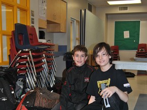 Colby Woods and Cart Wildetest out the programing on their robot during Robot Club at Percy Baxter on March 6.
Barry Kerton | Whitecourt Star