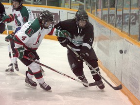 Kings forward Nick Harder battles for a bouncing puck in last Wednesday’s 1-0 loss in the fifth overtime to the South Side Athletic Club. Edmonton went on to win the series 3-2 on Friday with a 3-0 win. Photo by Shane Jones/Sherwood Park News/QMI Agency