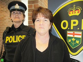MONTE SONNENBERG Simcoe Reformer
The Ontario Provincial Police are looking for a few more women like Const. Petra Hell, left, and Const. Teresa Ollen-Bittle of the Norfolk OPP. A three-day recruitment camp for 50 qualified women will be held in Orillia this July.