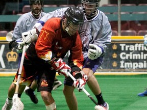 Ohsweken Demons' Wayne VanEvery and Barrie Blizzard's Tyler Gibbons battle for the ball Sunday during CLAX action. (Photo by Tim Prothero, Vintage LAX)