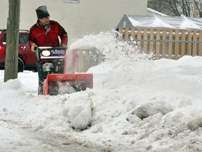 Phil Kelly was out Monday clearing snow off the sidewalk on Cedar St. S. following the large snowfall that covered Timmins Sunday night and Monday morning. Timmins are residents received 10-15 centimetres of the white stuff overnight, with another 10-15 centimetres expected to fall by Tuesday morning.