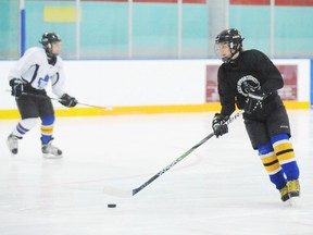 SARAH DOKTOR Simcoe Reformer
Delhi's Matt Demerast handles a puck during a practice at the Delhi Community Arena on March 9. The peewee Rockets will take on Minto Township during the OMHA peewee C playdown finals later this month.