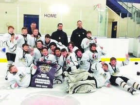 The Portage Peewee AA team celebrates their provincial gold medal in Thompson over the weekend. (Submitted photo)