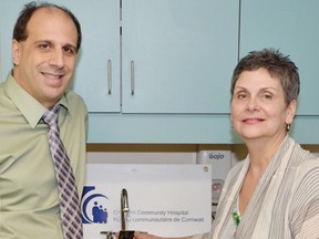 Mario Alibrando, director of information technology, and Nancy-Ann Bush, manager of infection prevention and control, at the Cornwall Community Hospital, show off the new Xperia Go. 
Submitted photo