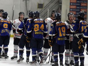 The Whitecourt Wolverines and Fort McMurray Oil Barons shake hands after game five, which Whitecourt won 4-3 to win the best of five series three games to two.  TREVOR HOWLETT/TODAY STAFF