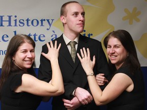 Some of Timmins' most eligible bachelors will take to the stage at the Porcupine Dante Club on March 22, as the Canadian Cancer Society hosts its Little Black Dress Event bachelor and prize auction. Neil White, centre, is hoping to go for top dollar during the event, and given the fawning attention of Regina Kos, left, and her sister Vittoria Kos-Chaumont he may just get his wish.