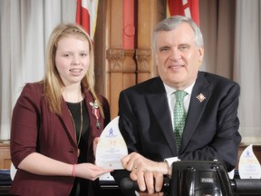 Norfolk youth Annaleise Carr, 14, was  presented with an Ontario Junior Citizen of the Year Award from the Honourable David C. Onley, Lieutenant Governor of Ontario, in a special ceremony held Friday, March 8, 2013  in Toronto.  (Contributed photo)