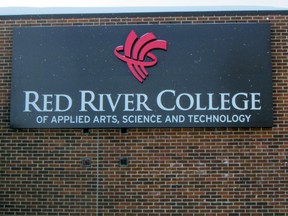 Two new signs now face Saskatchewan Ave. after they were installed by the Red River College Portage Campus, Monday. The sign above now sits on the north-west side of the building. (ROBIN DUDGEON/PORTAGE DAILY GRAPHIC/QMI AGENCY)