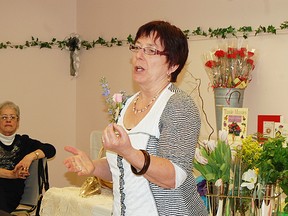 Marilyn Edmison-Driedger speaks to guests about the 'Language of Flowers' during the International Women's Day Luncheon, Friday at Annandale National Historic Site in Tillsonburg. Guests also enjoyed a floral themed lunch. KRISTINE JEAN/TILLSONBURG NEWS