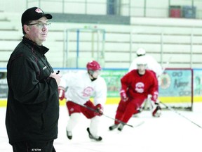 Pembroke Lumber Kings’ coach and general manager Scott Mohns keeps his eye on the action during practice drills at the Pembroke Memorial Centre Sunday morning. The Kings open their CCHL quarterfinal against the Nepean Raiders Wednesday night at the PMC starting at 7:30 p.m.