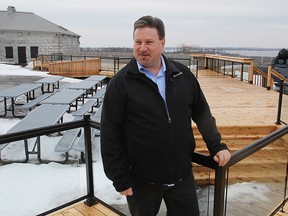 Neil Shorthouse, special events, promotions and sponsorship officer at Fort Henry, stands on the new patio in the upper fort that offers a view of Lake Ontario.
Michael Lea The Whig-Standard