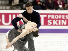 Canadian ice dancers Scott Moir, of Ilderton, Ont. and Tessa Virtue, of London, Ont. practice their short dance routine during day two of the ISU World Figure Skating Championships at Budweiser Gardens in London on March 12, 2013. (CRAIG GLOVER/QMI AGENCY)