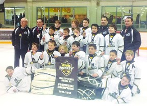 The Portage A1 Peewee team celebrates their provincial championship in Steinbach over the weekend. (Kelly Rouire/Submitted photo)