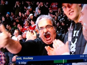 Kingston’s Venicio Rebelo, shown in this screen grab from a Hockey Night in Canada telecast, celebrates a Canadiens’ goal against the Pittsburgh Penguins during a March 2 NHL game in Montreal. Moments after his brief appearance on TV, Rebelo’s iPhone was inundated with text messages.