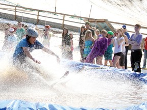 Hudson Boucha, 15, makes a big splash with the crowd at the annual end of season Slush Pit at Mount Evergreen Ski Hill, Sunday, March 18, 2012.
REG CLAYTON/KENORA DAILY MINER AND NEWS/QMI AGENCY