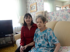 Sally Freeman pictured with her mother Eileen Sturdy at their residence in Trenton. Freeman is a full time care giver and says the provincial government has to step up to the plate when it comes to funding agencies that provide care for patients in the the home.

Emily Mountney/Trentonian/QMI Agency