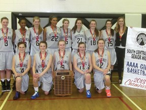 The George McDougall Mustangs senior girls’ basketball team celebrate their South Central Zone 4A championship at George McDougall on Friday night. Head coach Joe McLaughlin, far left, is retiring after 17 seasons coaching the team and this week’s 4A provincial championships in Calgary will be his last games in charge of the team.