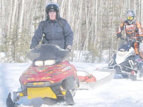 Snowmobilers took advantage of a sunny afternoon on Friday March 8 and rode the Peace Valley Snow Riders Leddy Lake Trial (north of Peace River). Pictured (l-r): Jarrett Fulcher (Snow Riders Treasurer) Logan Fulcher and Robert Cole (Sustainable Resource Development) on their sleds.