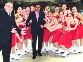 Elgin-Middlesex-London Conservative MP Joe Preston, left, turns over Minister of Sport Bal Gosal to members of the Synchronicity precision skating team Wednesday on the ice at the Timken Centre. The team, Canadian intermediate champions, performed for the minister who is visiting local athletes while he is in the area for the World Figure Skating Championshups in London. R. MARK BUTTERWICK / St. Thomas Times-Journal / QMI AGENCY