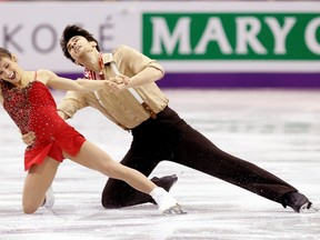 Meagan Duhamel of Lively and Eric Radford of Canada perform their pairs short program at the ISU World Figure Skating Championships in London, March 13.  REUTERS/Mark Blinch